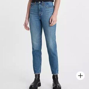 Levi’s Medium Wash Blue High Waisted Frayed Hem Wedgie jeans size 24